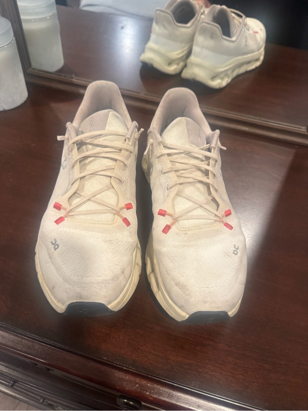 On Running Men's Athletic Shoes in Light Beige with Red Accents